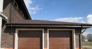 Принцип работы автоматических секционных ворот