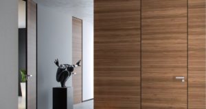 Дверь со скрытой коробкой и стеновыми панелями: особенности и преимущества