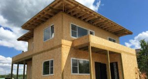 Дома из СИП-панелей: особенности и преимущества